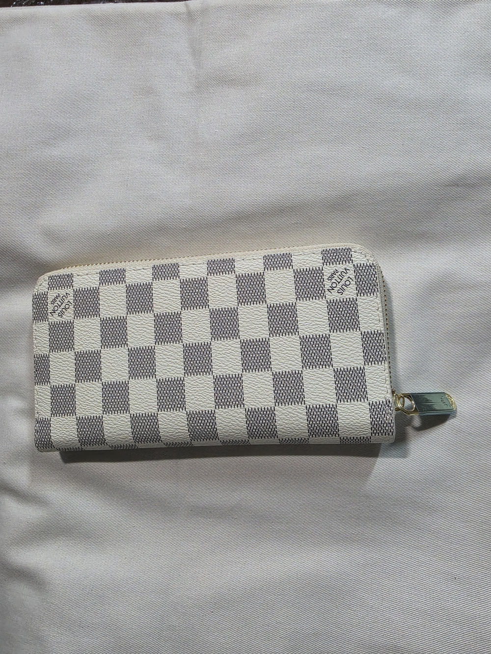 White and Gray Checkered Zip Wallet